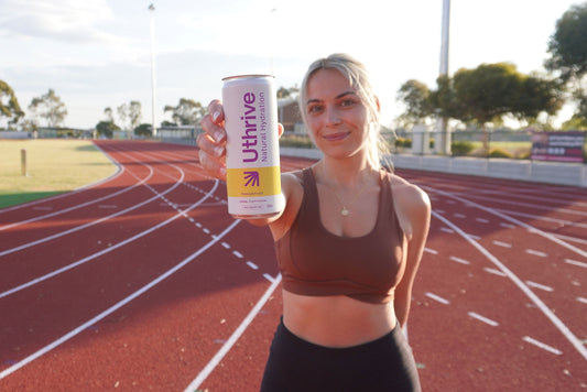Athlete training in hot Australian conditions with proper hydration strategy